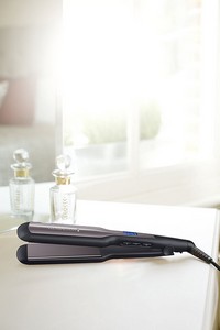 piastra per capelli a vapore